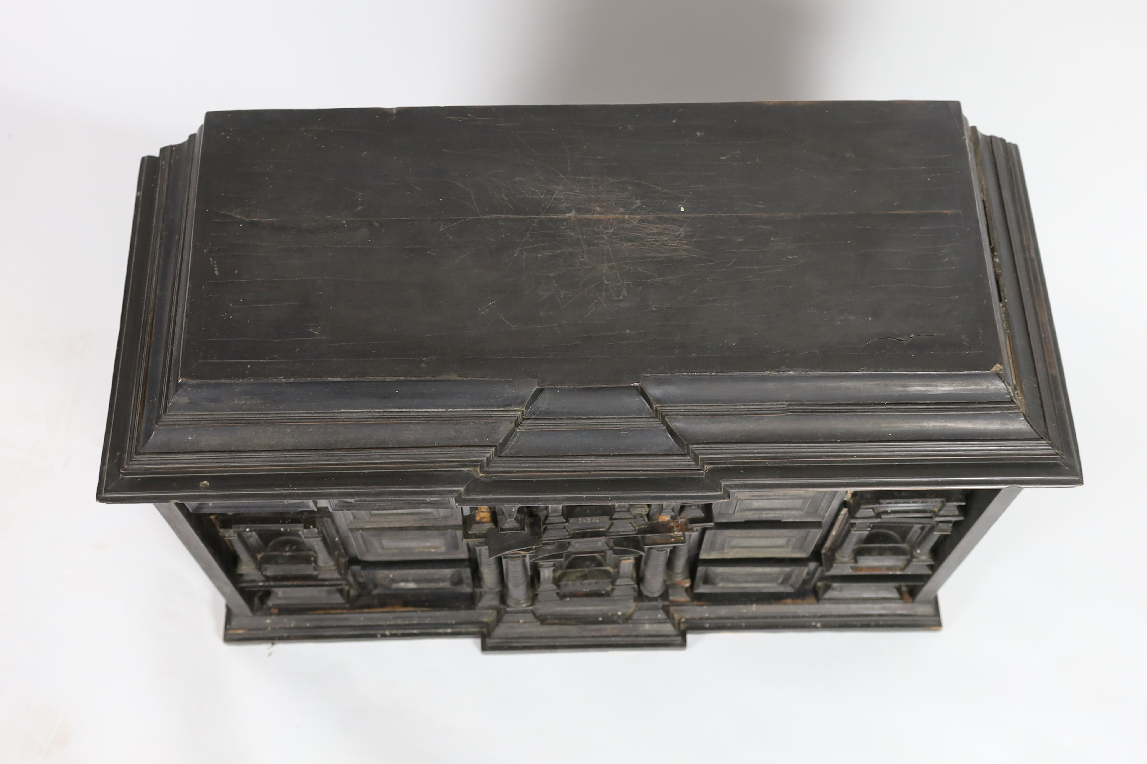 An early 18th century Portuguese ebonised table cabinet, width 87cm, depth 38cm, height 57cm